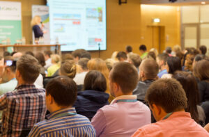 Audience at the conference hall. No recognisable faces