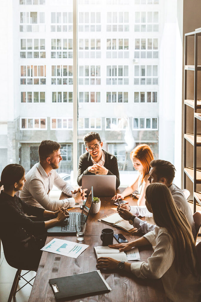 An image of young business peoples working in a team together.